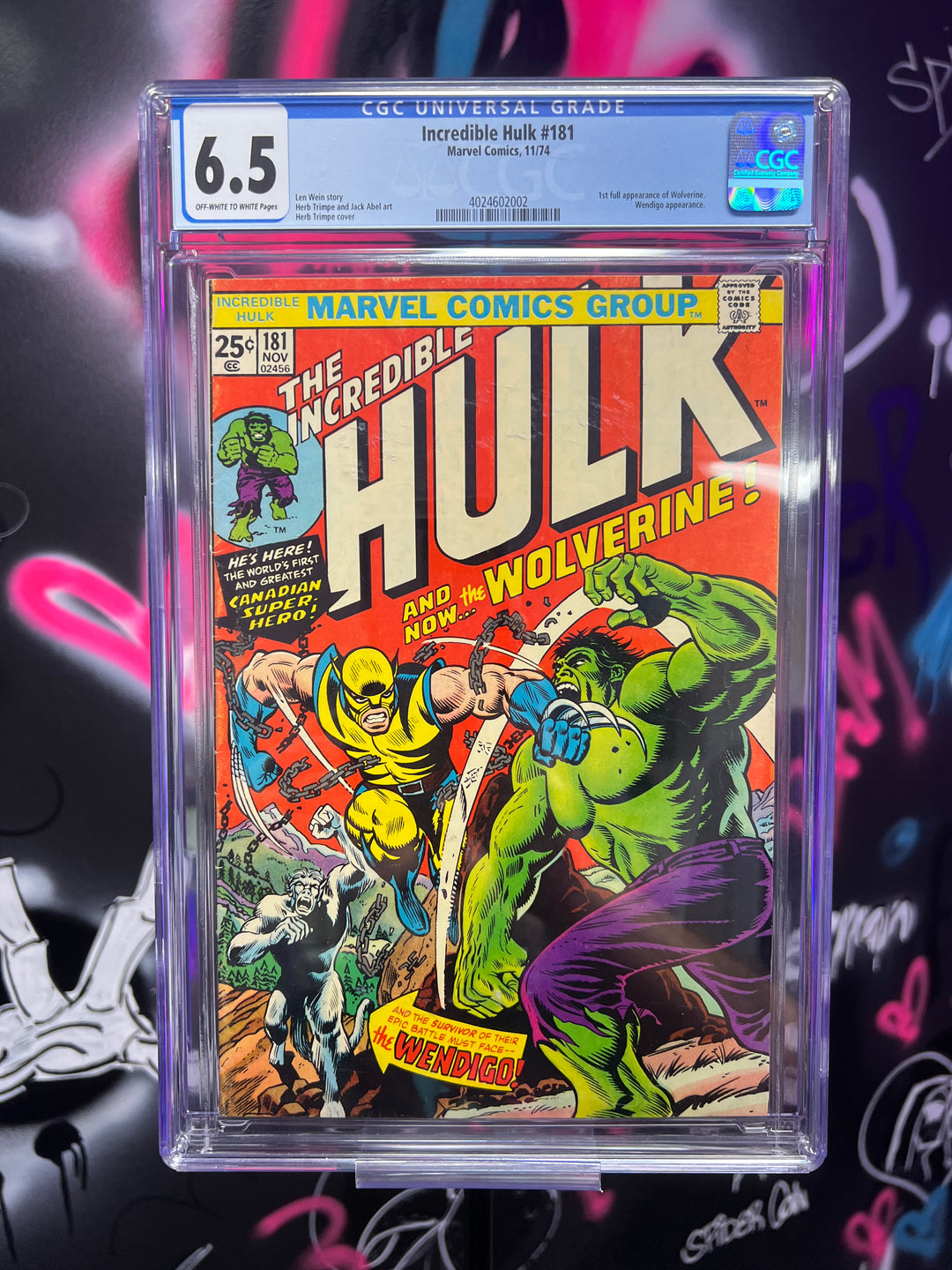 A collectible comic book of 'The Incredible Hulk' featuring the first appearance of Wolverine, with a cover showing the Hulk and Wolverine characters.