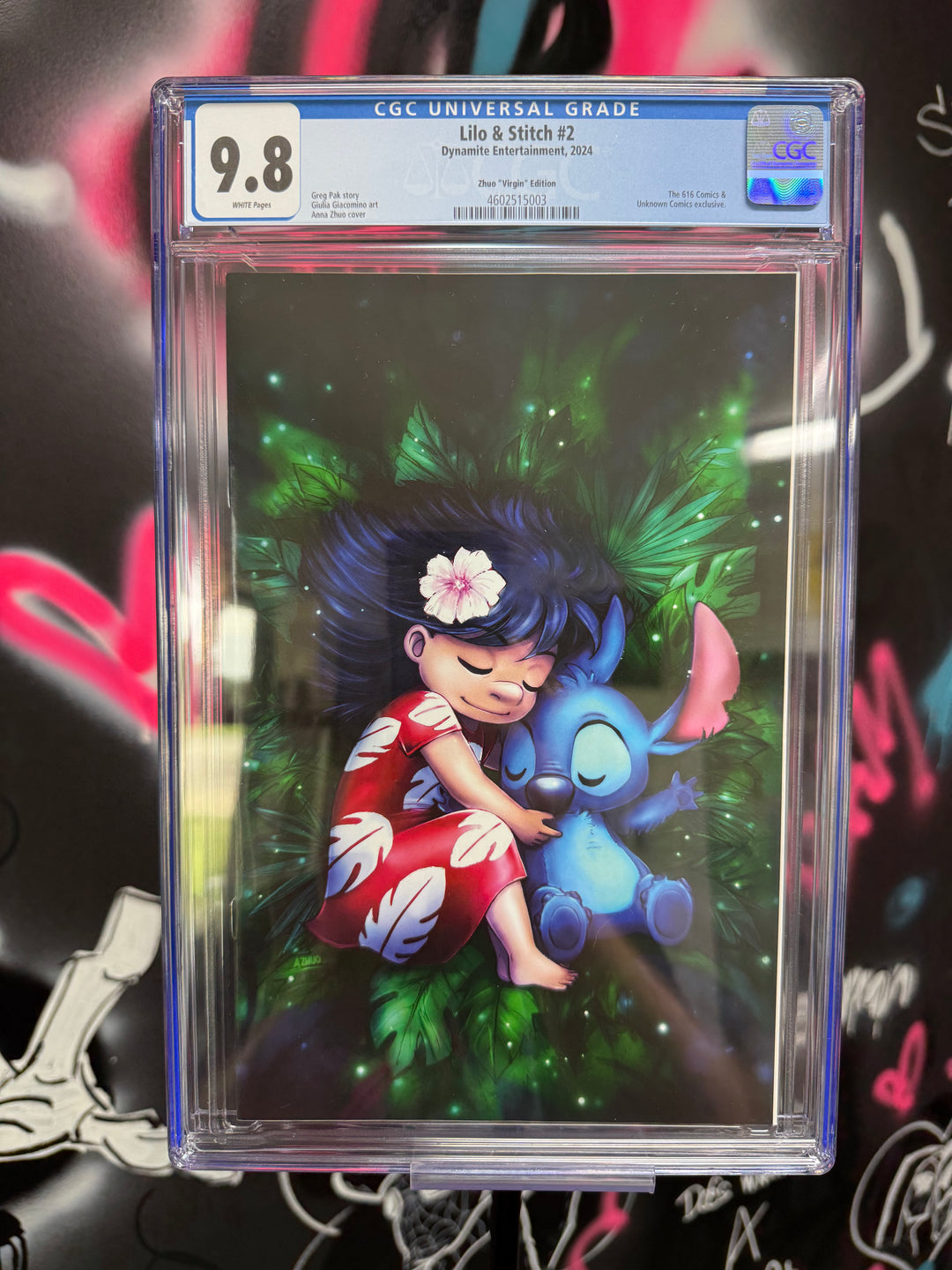 Comic book featuring a character holding a plush toy with a CGC grading label on a colorful background.